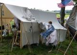 suzie battling with canvas on a windy day